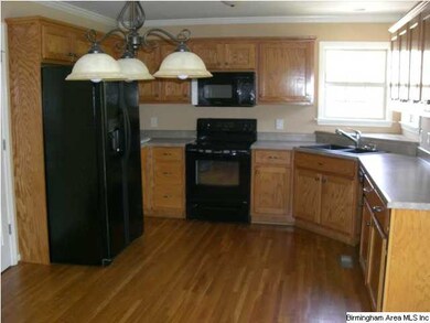 Large Kitchen with lots of cabinets and a pantry, 