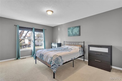 Large master bedroom with walk in closet and full ensuite bath
