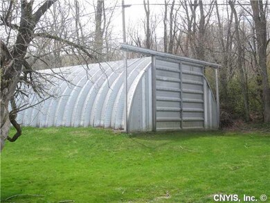 Exterior Front. 40 x 20 Quonset hut on cement foun