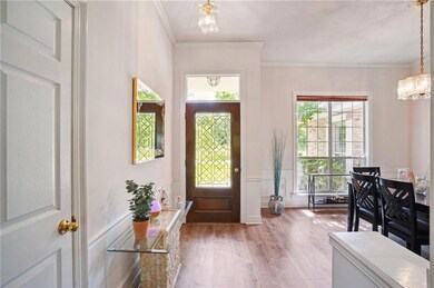 View towards front door and dining room
