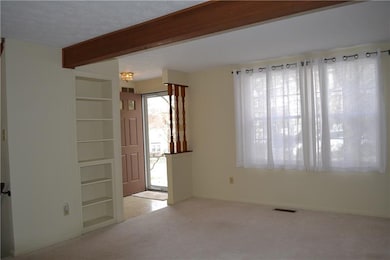 Living room and entry area.