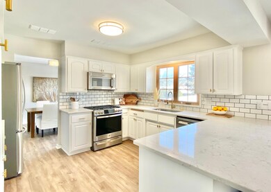 Kitchen has been updated and has TONS of cabinet and counter space