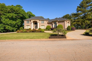 View of front of house featuring a front yard, bri