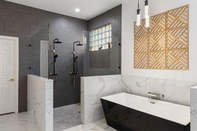 Luxurious free standing tub with maximum output on faucet.