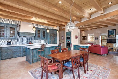 Artisan Tiles and Distressed Wood Cabinetry