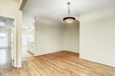 Dining room open to living area. Secondary bedroom