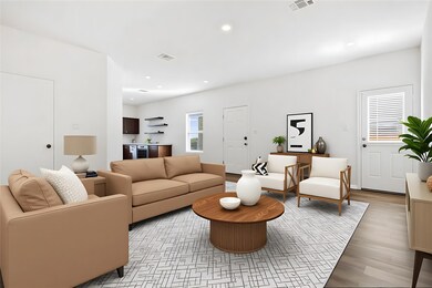 Living room featuring recessed lighting and light