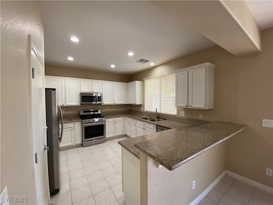 Kitchen featuring stainless steel appliances and t