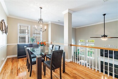 Formal dining room opened to living area and conne