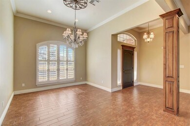 Spare room featuring ornamental molding, a notable
