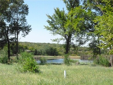 View of the pond and the hills off the back of the