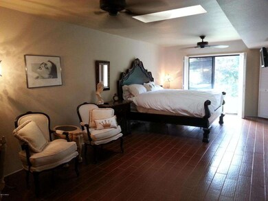 Master bedroom includes sitting area