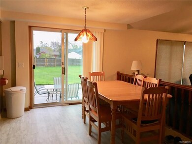 New Laminate flooring in kitchen & eat in area wit