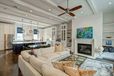 Open concept Living room with gas log fire place,