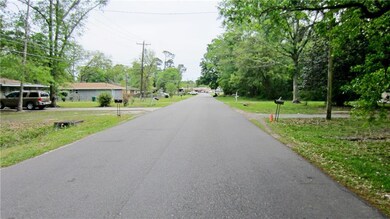 In front of Lot looking towards Gause Blvd.