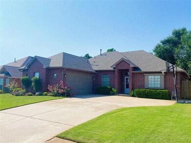 View of front of property featuring a garage and a