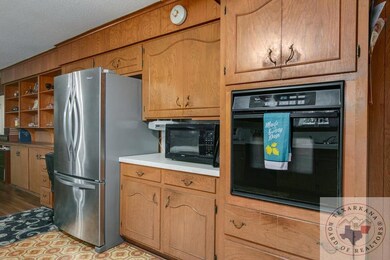 333 W Greenfield Dr, Wake Village, TX 75501 - photo 7