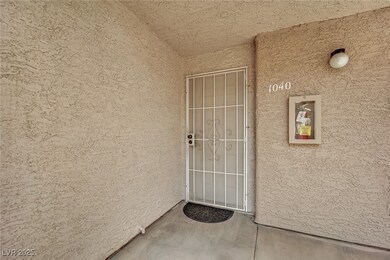 Entrance to property featuring stucco siding