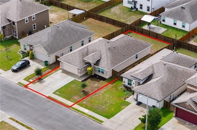 Aerial perspective of suburban area with property boundaries highlighted