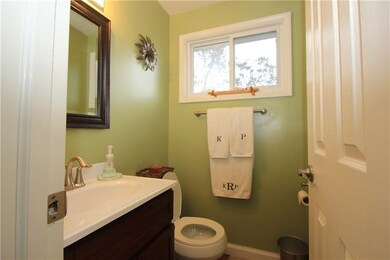The first floor powder room is nicely updated with