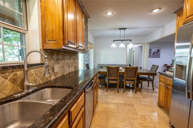 Granite counter tops and beautiful cabinets.