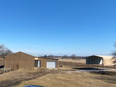 Great mini-farm barn has stalls already inside and
