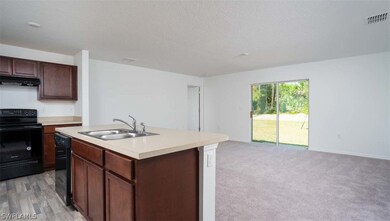 2710 NE 3rd Ave, Cape Coral, FL 33909 - photo 5