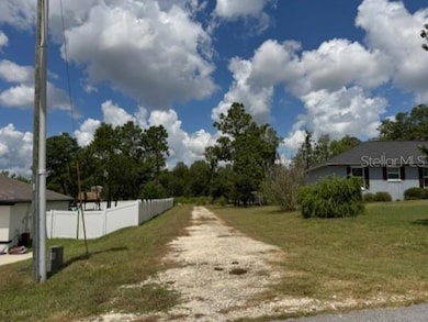 Flag Entry to Acreage with Base Rock Laid Out