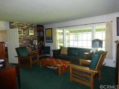 Living Room Looks Out to Huge Yard