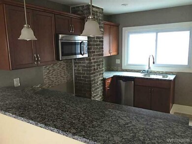 Kitchen Check out the exposed chimney - cool touch