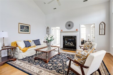 Living Room with Vaulted Ceiling and Ceiling Fan