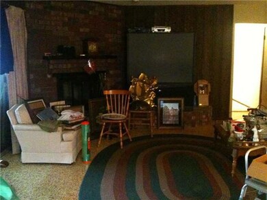 Den/Family/Great Room. Great Room with Large Brick