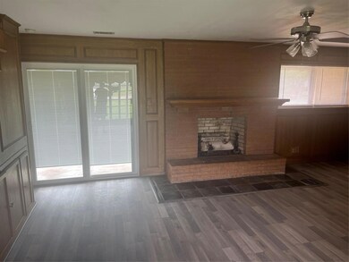 Picture-frame paneling, wood-style floors, ceiling