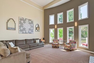 Great Room with Floor to Ceiling Windows