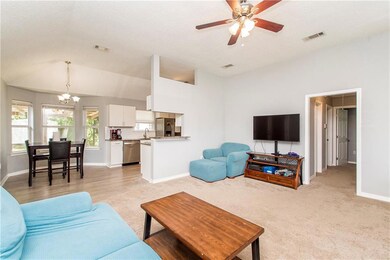 Living room facing kitchen