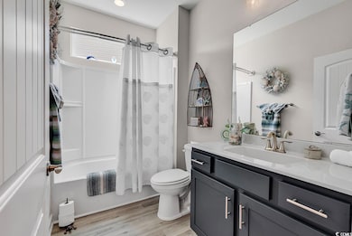 Full bathroom with shower / bath combination with 