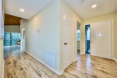 Enjoy lush wooded views from this BEAUTIFULLY REMO