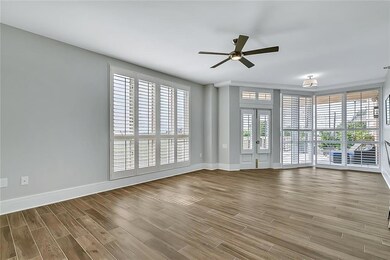 Living room with new floors, paint, and plantation