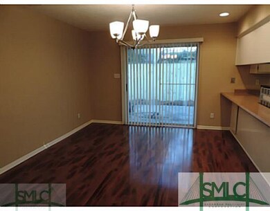 Dining Room. View towards Patio with Breakfast Bar