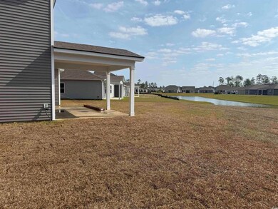 View of yard with a water view, a residential view