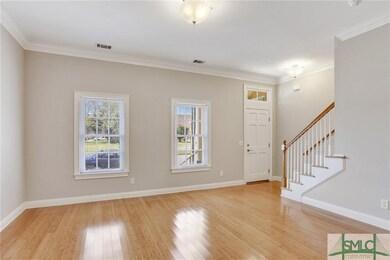 Soothing neutrals and high-polish bamboo flooring 