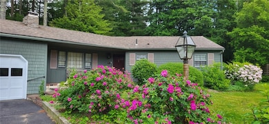 Beautiful blooms surround the property.