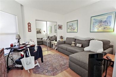 Living area featuring light wood-style flooring