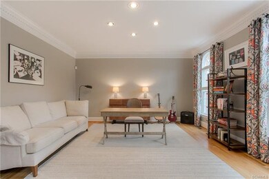 French doors open to the large Living Room/Office!