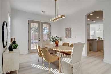 Dining space featuring light wood-style floors, ar