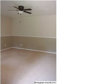 Freshly painted living room w/ new ceiling fan and