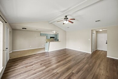 Large living area featuring recently installed lux