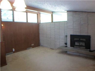 Living room with vaulted ceilings