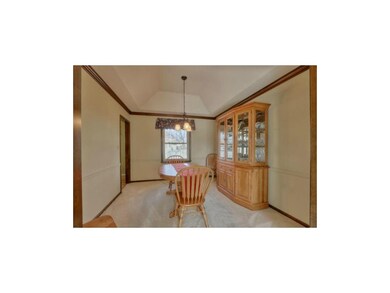 Formal dining w/new carpet, crown molding & new oi