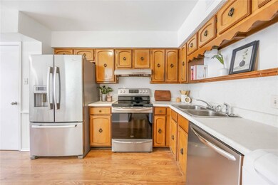 Kitchen appointed with stainless steel appliances for a clean, modern look.